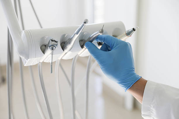 Professional Tooth Extraction technician working in Kalamazoo County County, MI